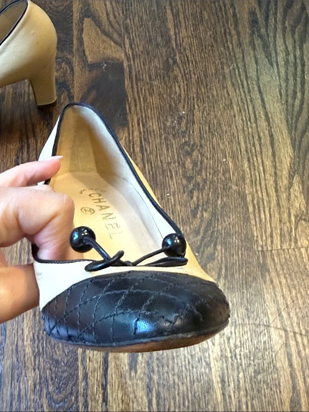 CHANEL Beige and Black Quilted Cap-Toe Bow Pumps size 39